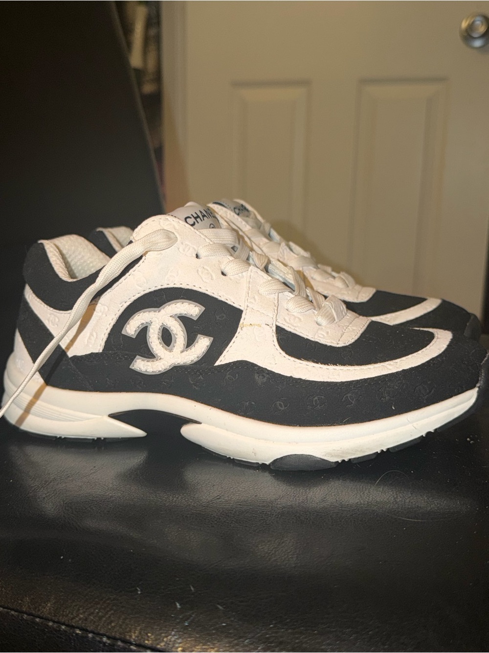 CHANEL Black and White Logo Runner Sneakers